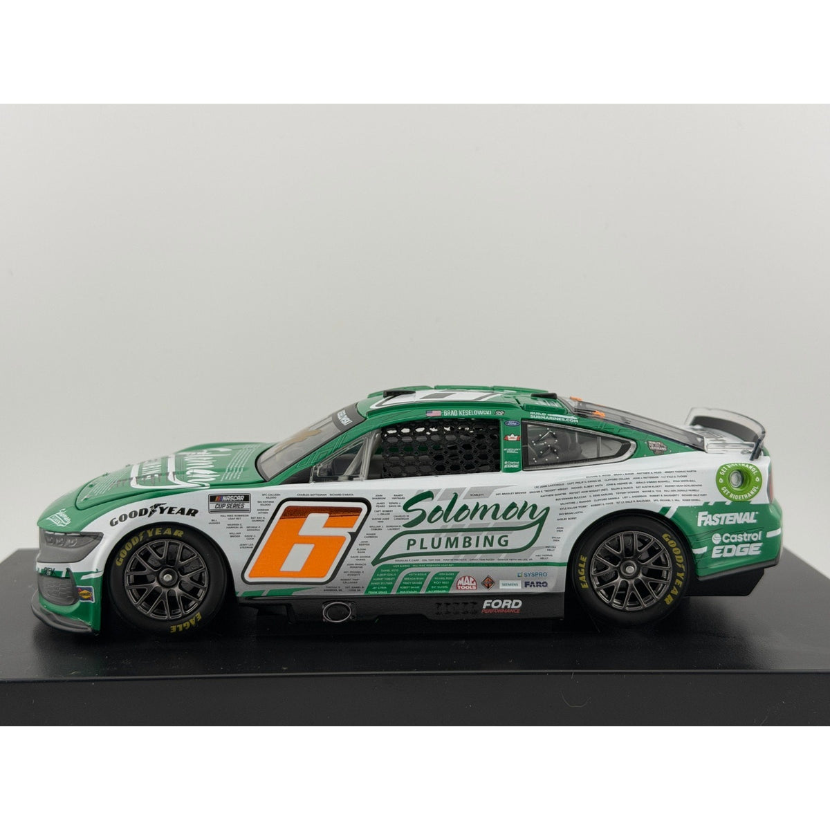 Brad Keselowski #6 Solomon Plumbing Veterans 2024 Mustang Autographed 1/144 DIN 76