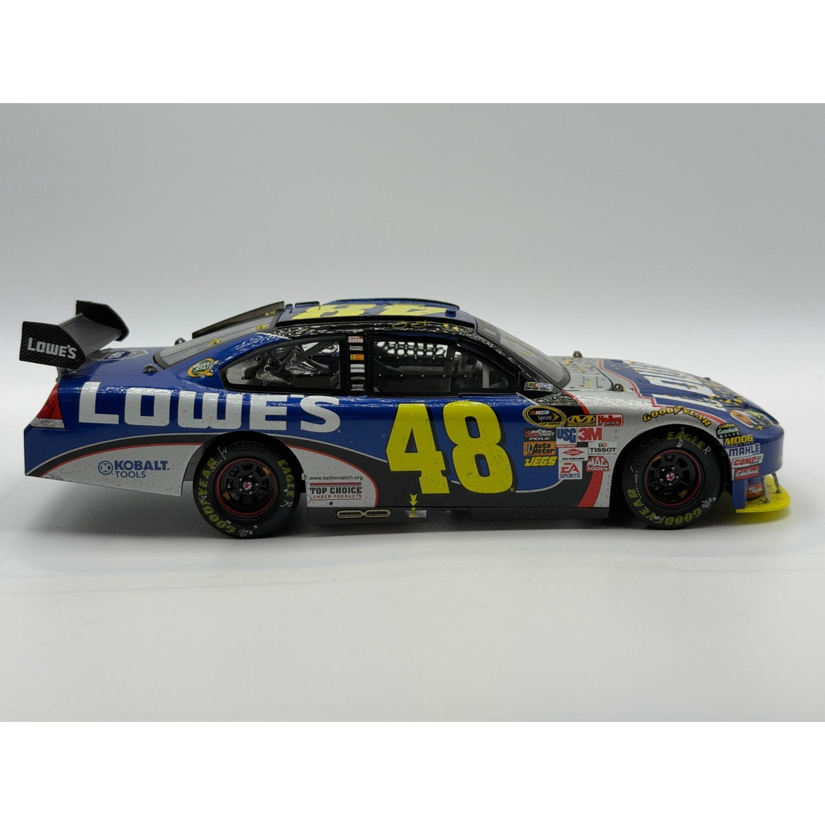 Jimmie Johnson #48 Lowe's 2009 Sprint Cup Champ Raced Version 1/5572 DIN 2549