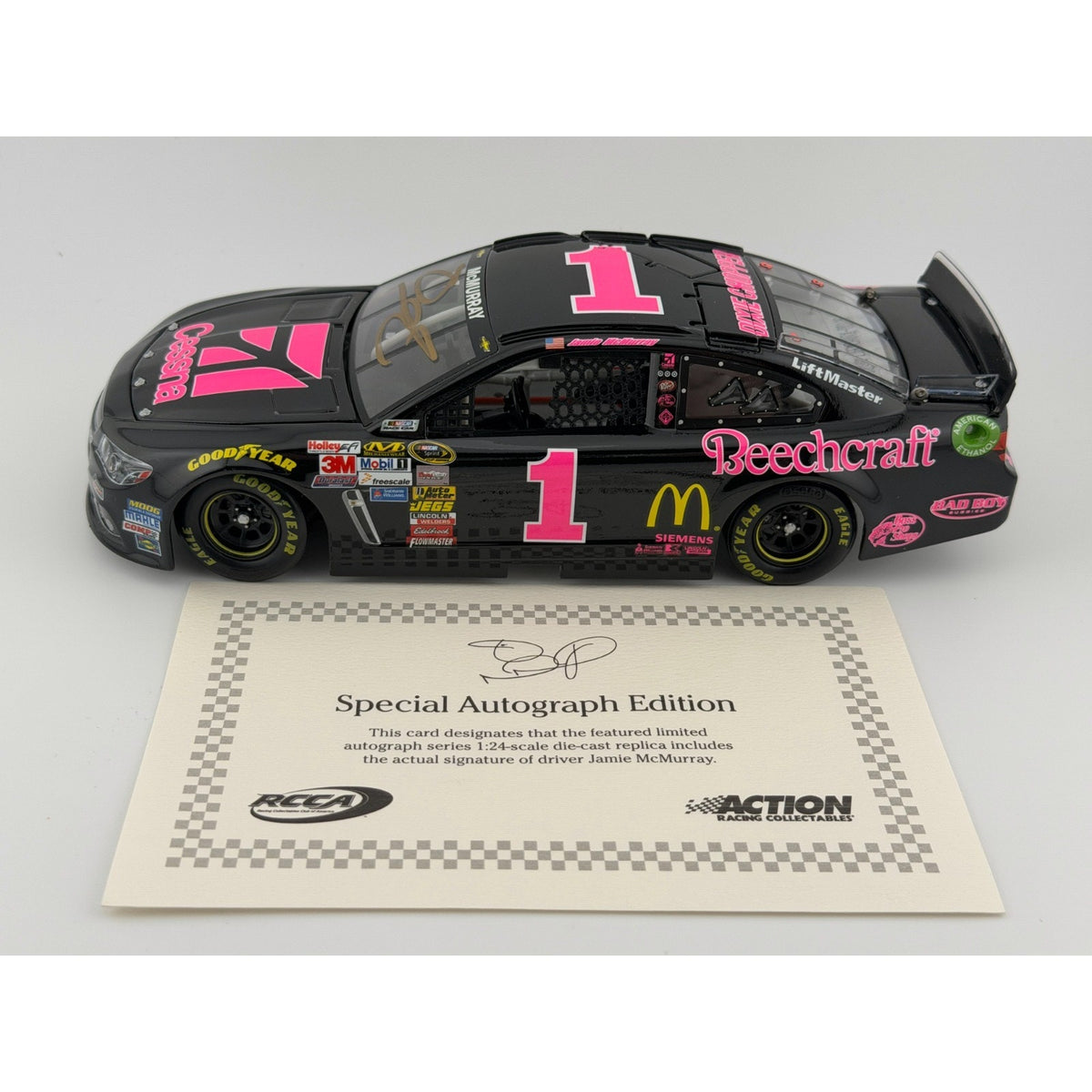 Jamie McMurray #1 Cessna Breast Cancer 2014 Chevy SS Autographed 1/144 DIN 115